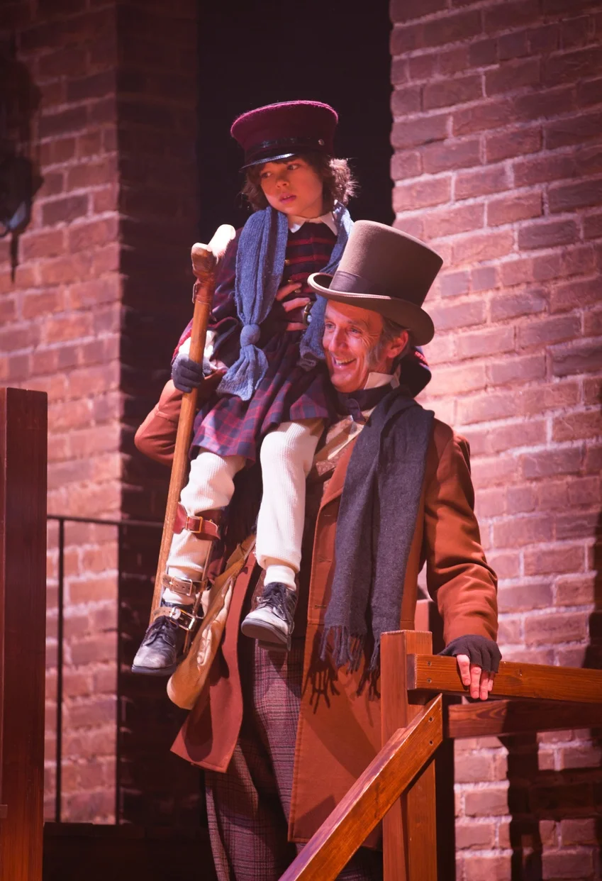 Tiny Tim (Fred Thornley IV), Bob Cratchit (Robert Hannon Davis) (photo: T. Charles Erickson)
