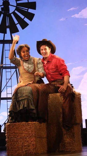 Aunt Eller (Terry Burrell), Curly (Rhett Guter) (photo: Diane Sobolewski)