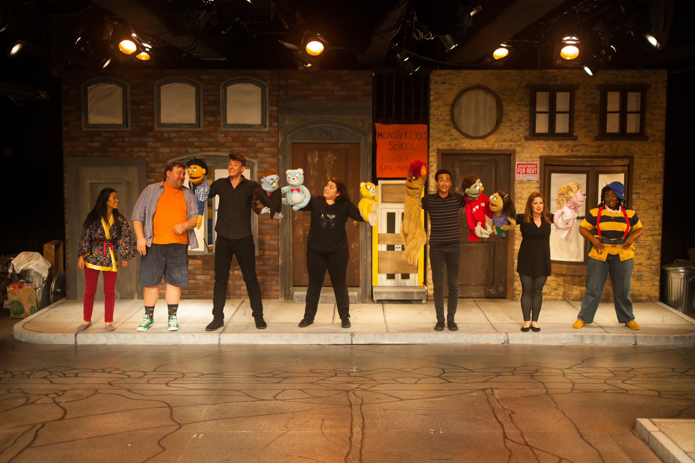 The cast of Avenue Q (left to right): Christmas Eve (EJ Zimmerman), Brian (James Fairchild), Princeton/Rod (Weston Chandler Long), Bad Idea Bears (Colleen Welsh), Trekkie/Nicky (Peej Mele), Kate/Lucy (Ashley Brooke), Gary Coleman (Abena Mensah-Bonsu) (photos courtesy of Curt Henderson, Imagine It Framed)