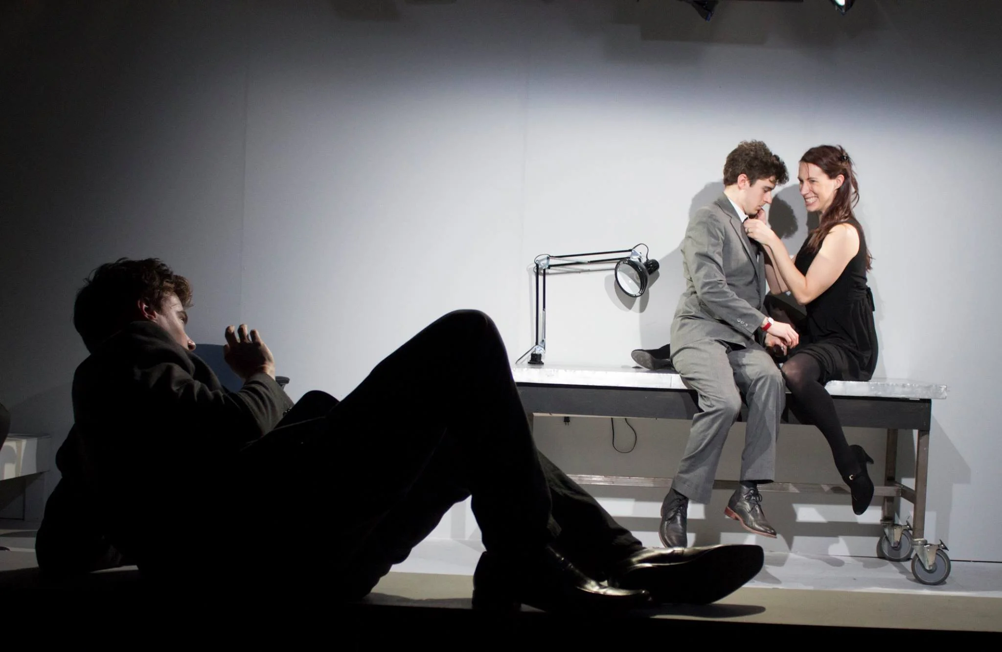 foreground: the son (Steven Johnson); background: Lette (Patrick Madden), the mother (Emily Reeder)