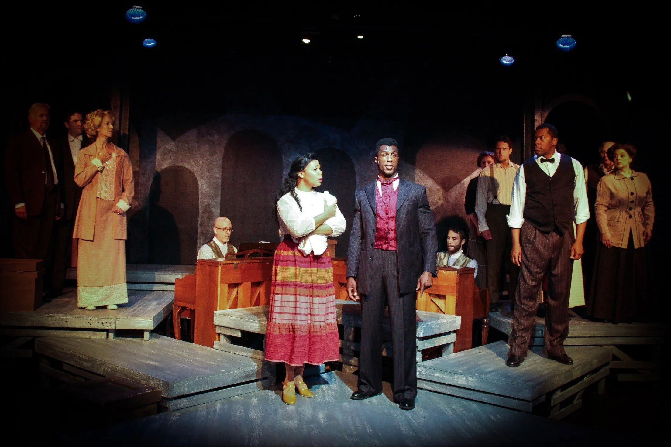 Sarah (Soara-Joye Ross), Coalhouse Walker, Jr. (Ezekiel Andrew), center, and the cast of Ragtime