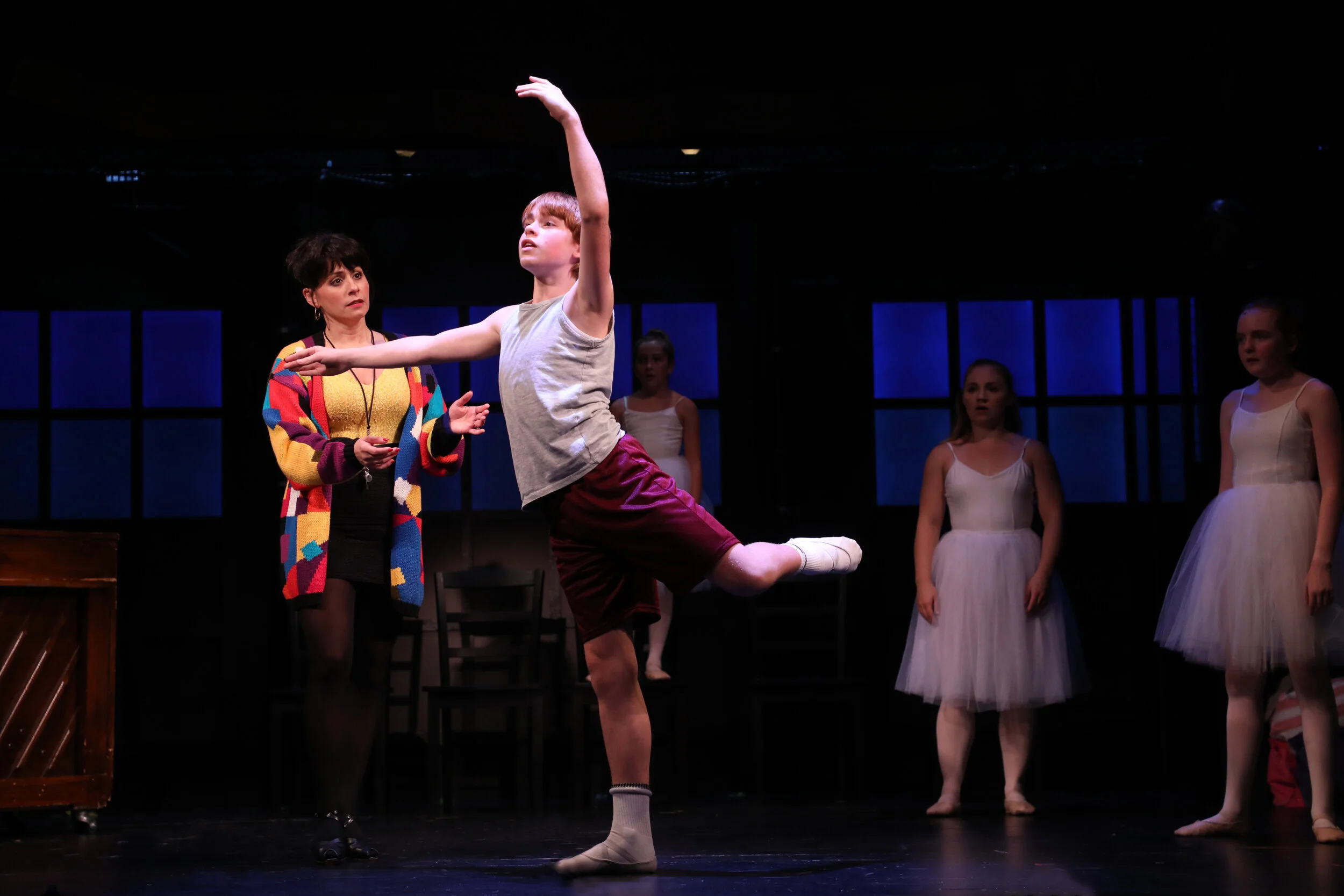 Mrs. Wilkinson (Michelle Aravena), Billy Elliot (Liam Vincent Hutt) with the cast of Goodspeed Musicals’ Billy Elliot The Musical . Photo by Diane Sobolewski