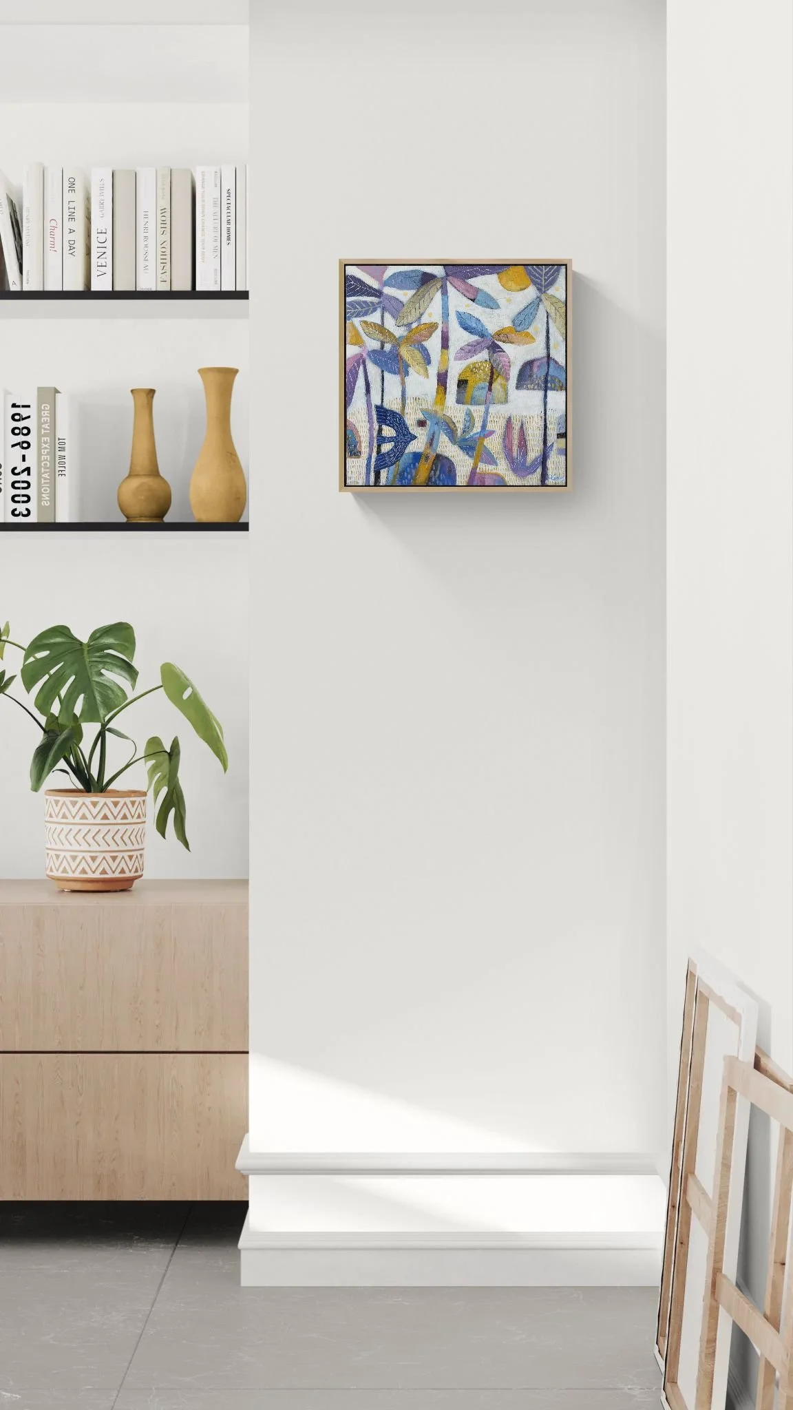 Living room corner with a cabinet and shelving (6).jpeg