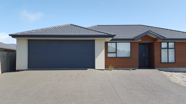 Black exposed aggregate christchurch driveway