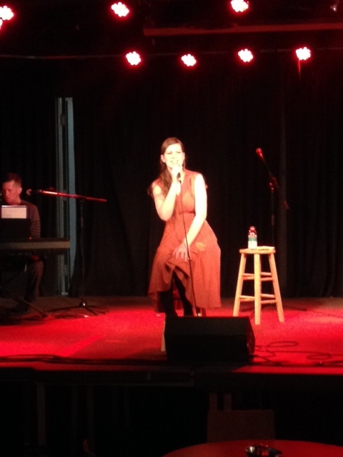 A blurry photo of me during my first solo produced show thanks to my mom's friend April!