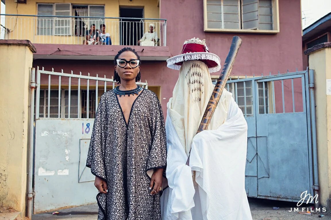 Nigerian Soul Artist Asa with an Eyo Masquerade; a major culture symbol of the Yoruba people / Via thestylehq
