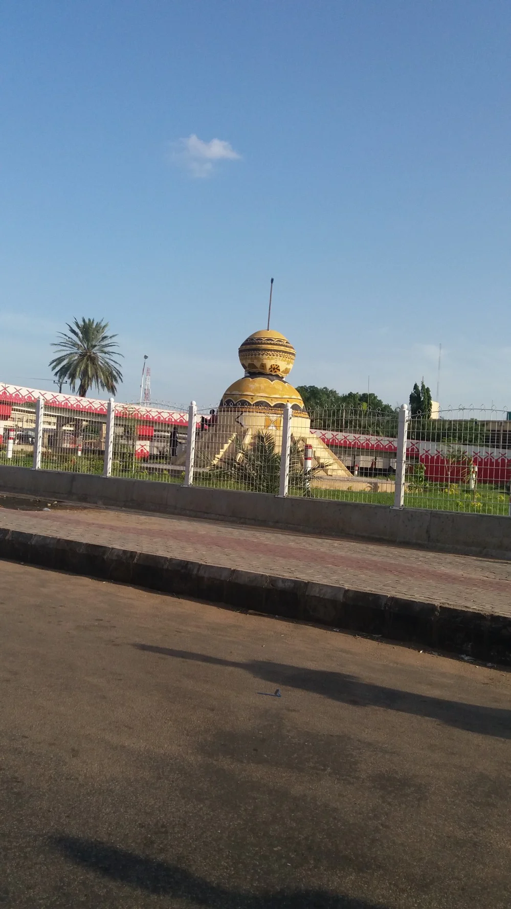 Street Monument representing Curved Calabash, Popularly used for storage and carriage of Fura D’ Nunu