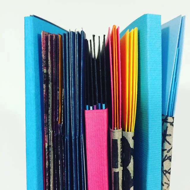 I'm about a third of the way through making the example books from 'Woven and Interlocking Book Structures' by Claire Van Vliet and Elizabeth Steiner. Elephant hide is my new favourite paper!