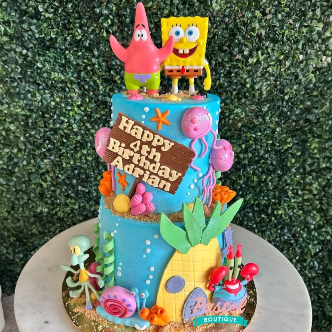 🍍 Who lives in a pineapple under the sea... and is now on a 2-tier cake?! 🧽✨
We had SO much fun bringing Bikini Bottom to life! 
Need a cake that makes a splash? Click the link in our bio to order! 🥳 #SpongeBobCake #BikiniBottom #pastelboutiquehtx