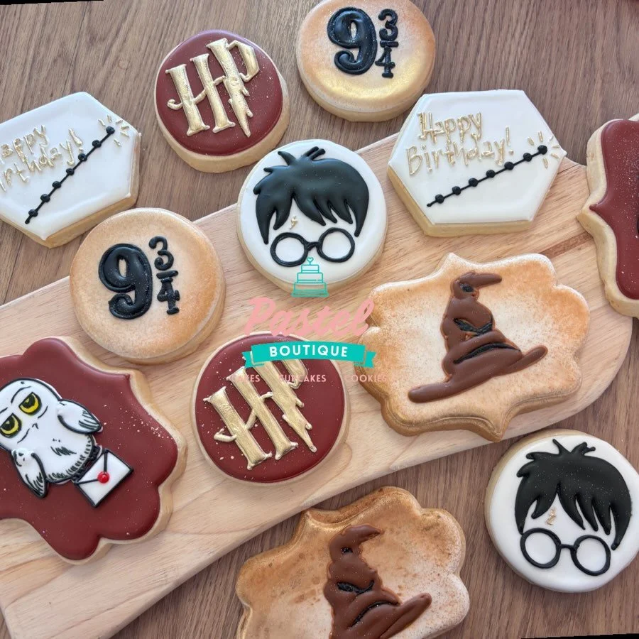 A little birthday magic straight from the wizarding world. ⚡️ These Harry Potter-inspired cookies make any celebration spell-tacular. 🏰🐍 #customcookies #pastelboutique #sugarcookies #harrypotterfan #thewizardingworldofharrypotter