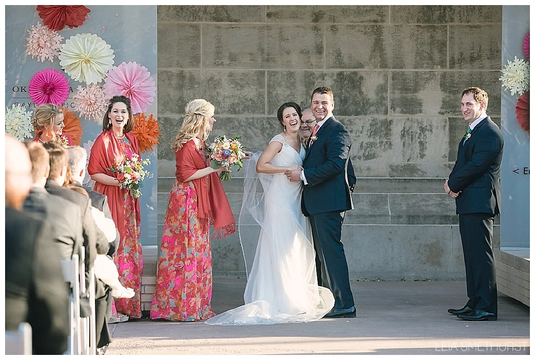 The moment they were pronounced husband and wife, the crowd cheered. So did Okie! He barked with excitement and made everyone laugh- it was adorable. 