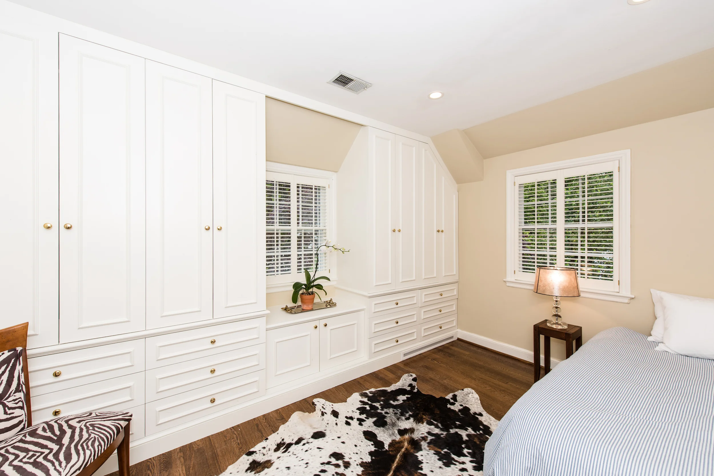 Bedroom Four with Custom Closets