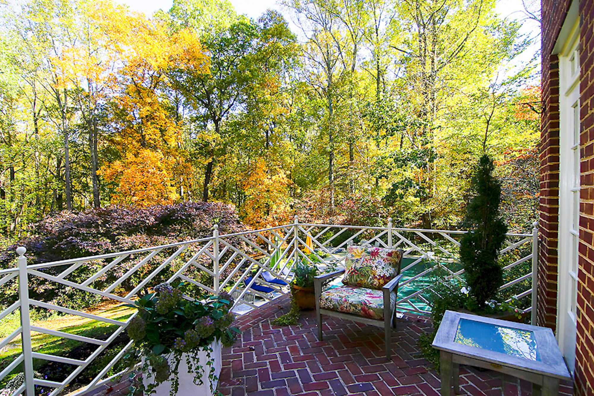 One of two herringbone brick terraces on the main floor