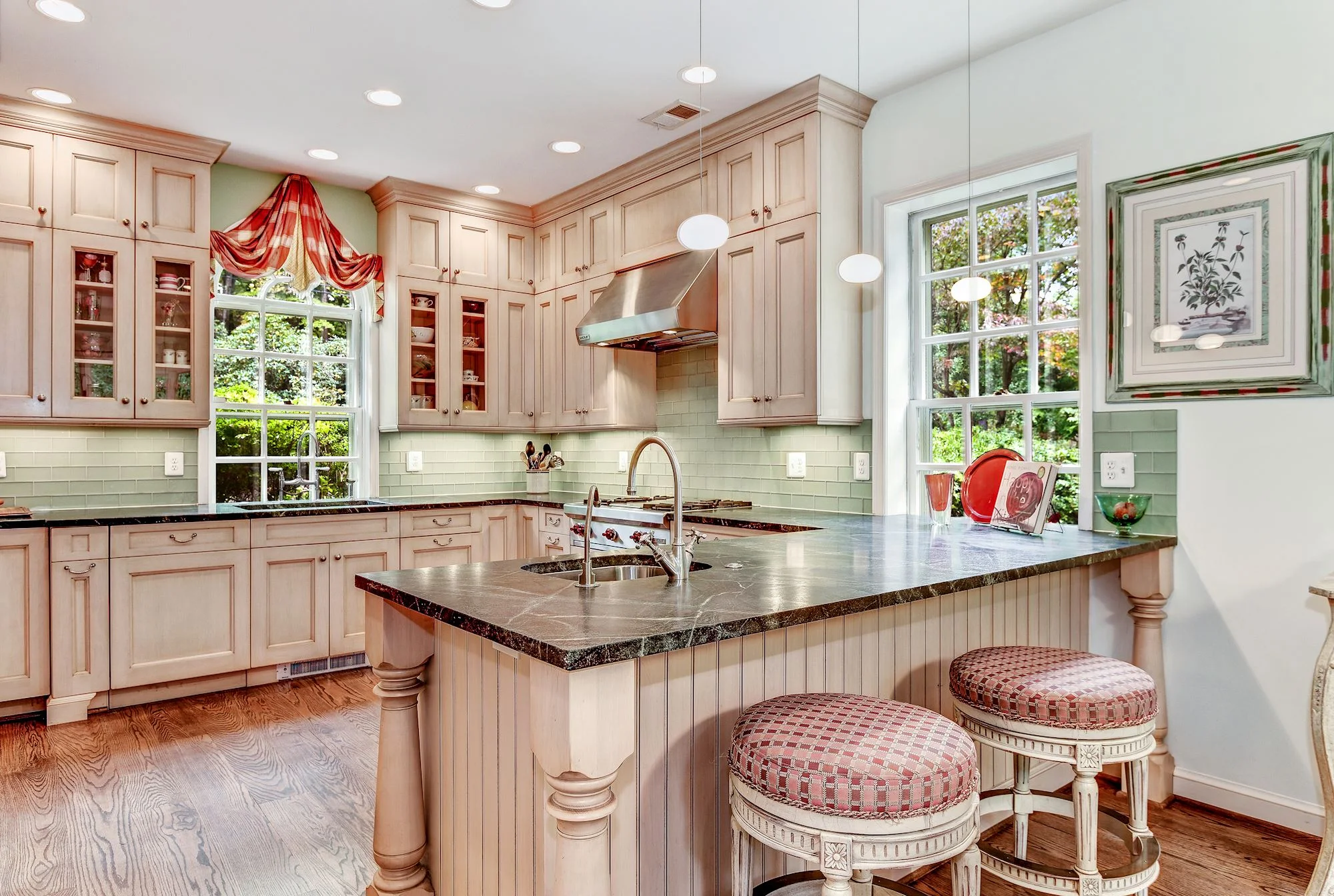 The Jennifer Gilmer Kitchen features a breakfast bar as well as a generous informal dining area