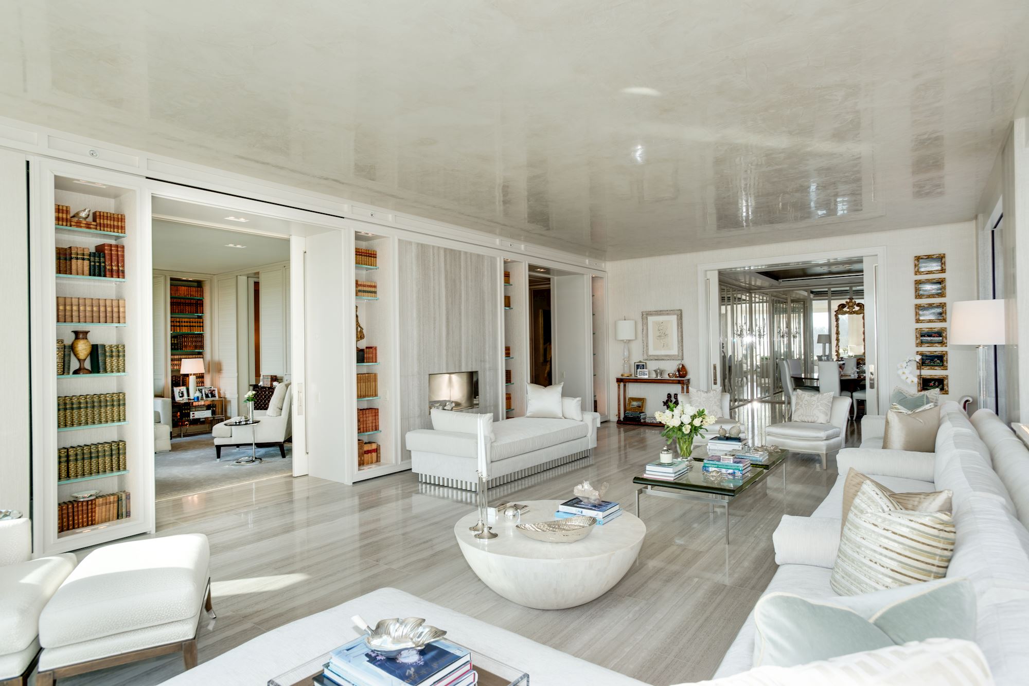 Living Room Opens to Library and Balcony