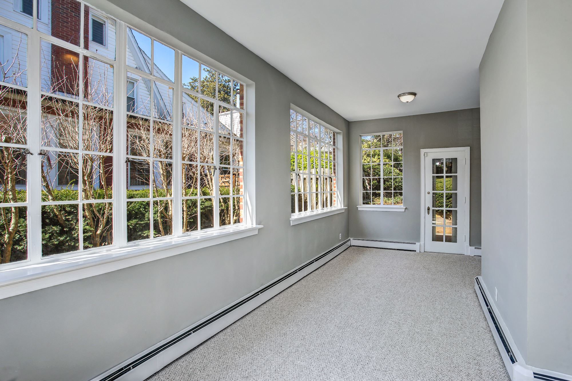 Sunroom Opens to Terrace