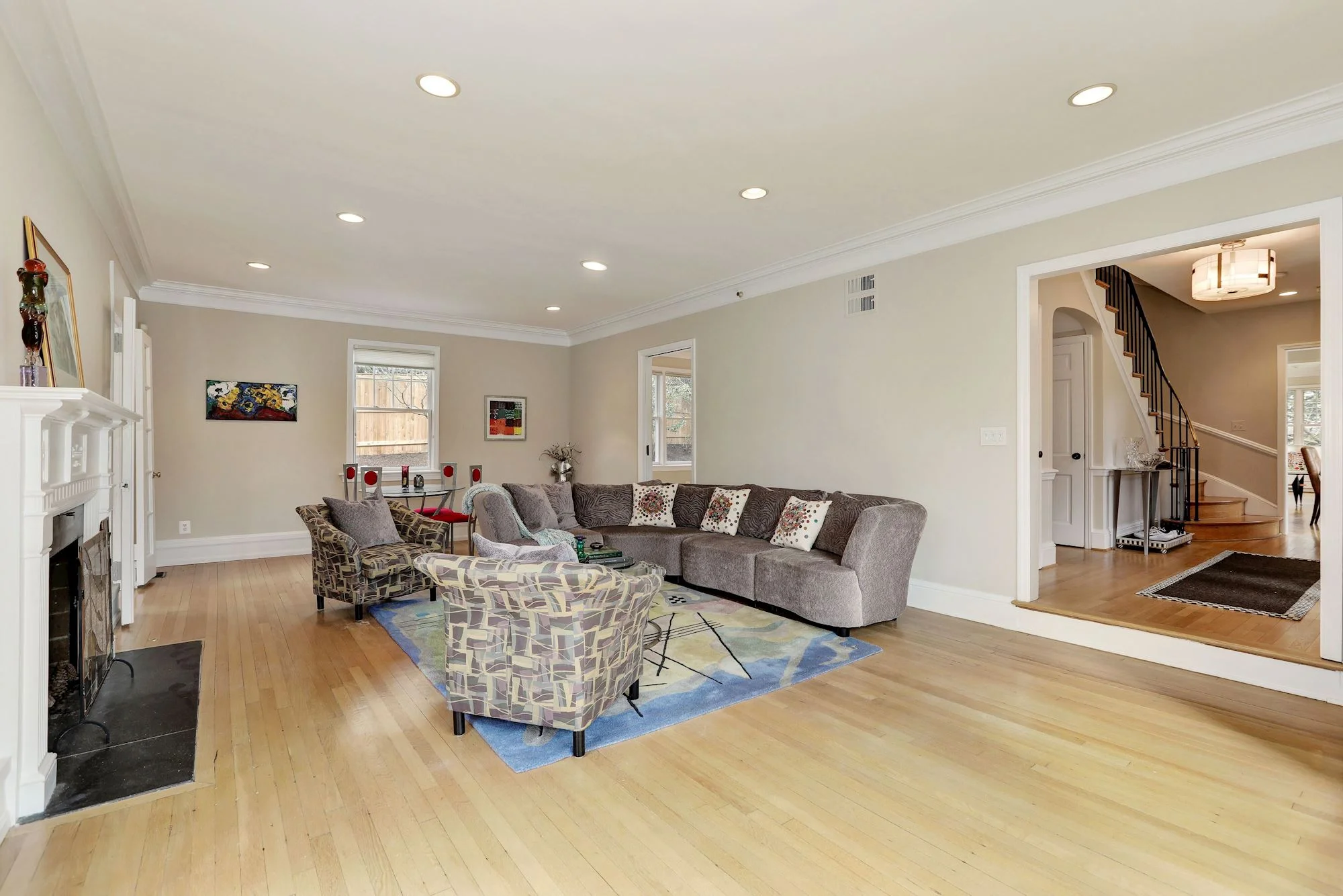Living Room features high ceilings & recessed lighting