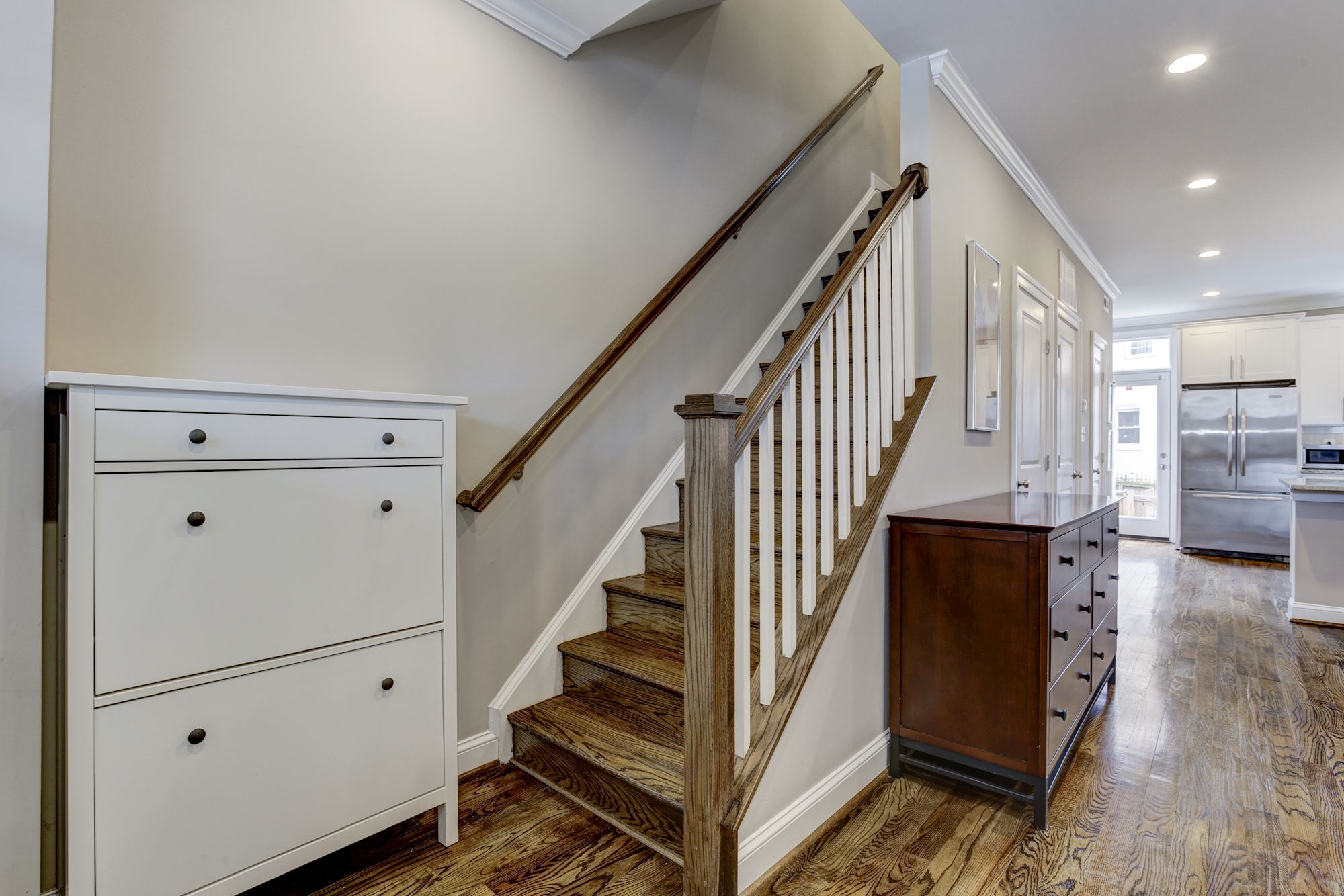White Oak Hardwood Flooring throughout the Main Level and Upper Level