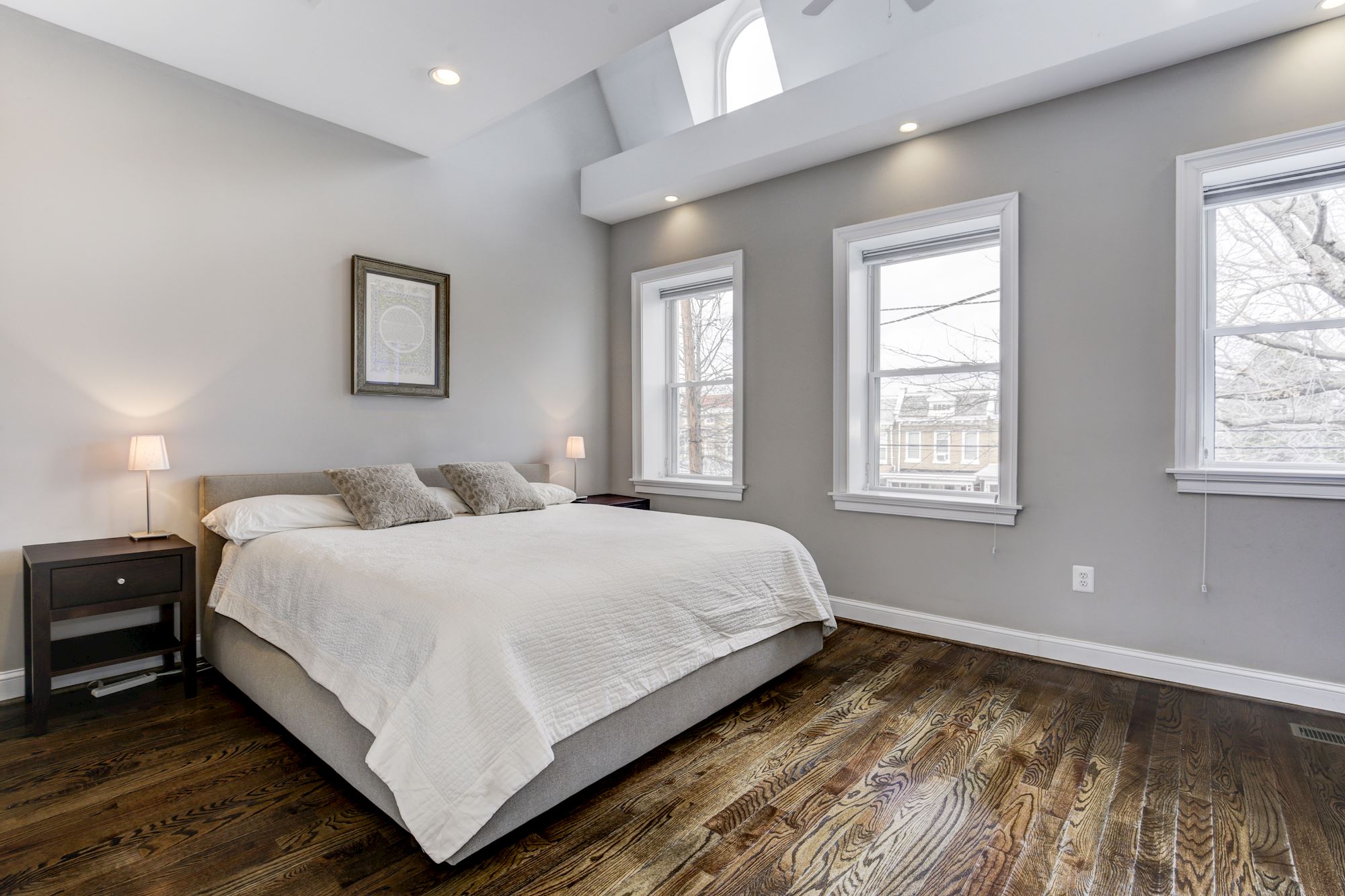 Master Bedroom features high ceilings & skylights