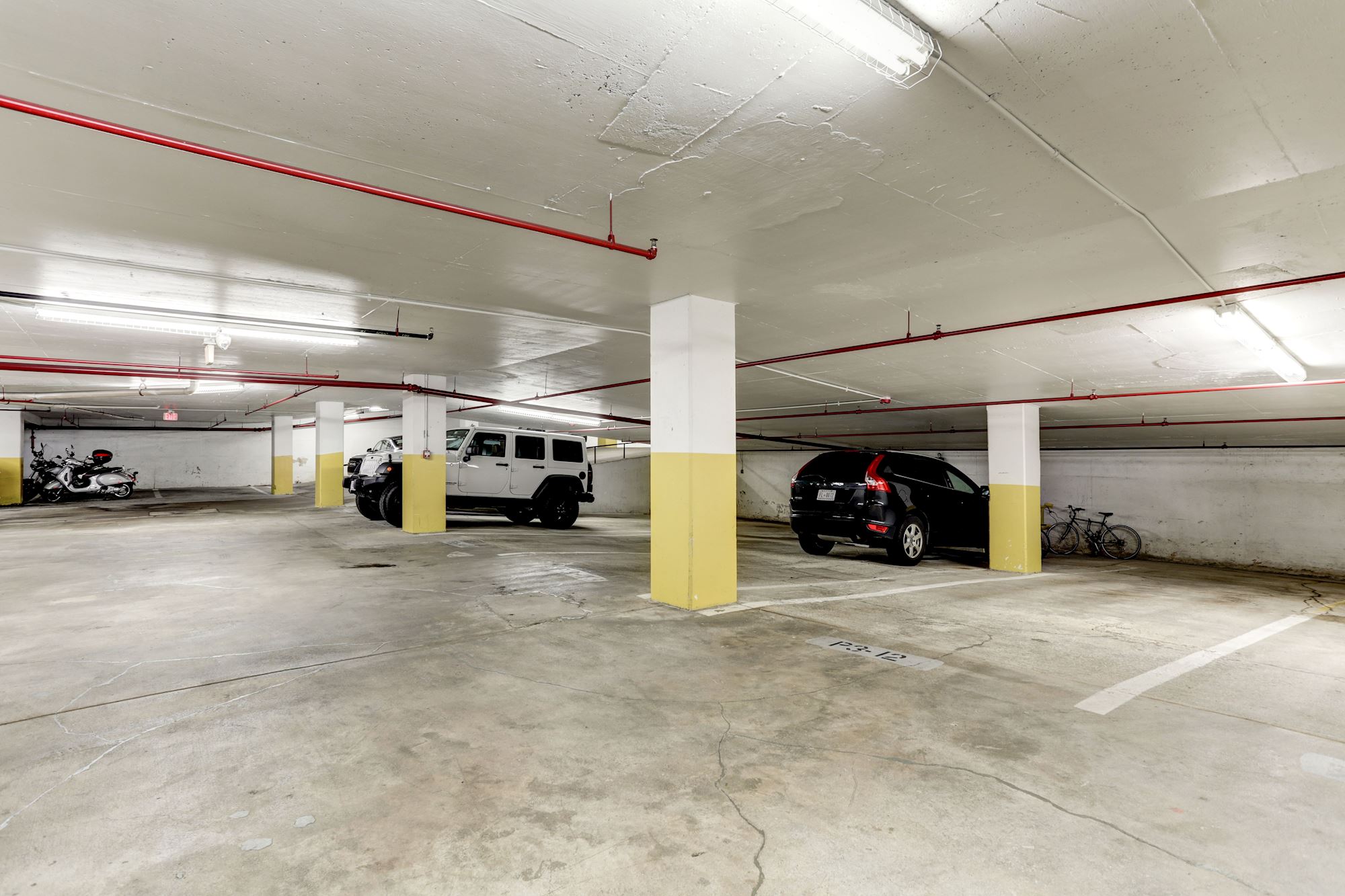 Two Assigned Garage Parking Spaces and Additional Storage