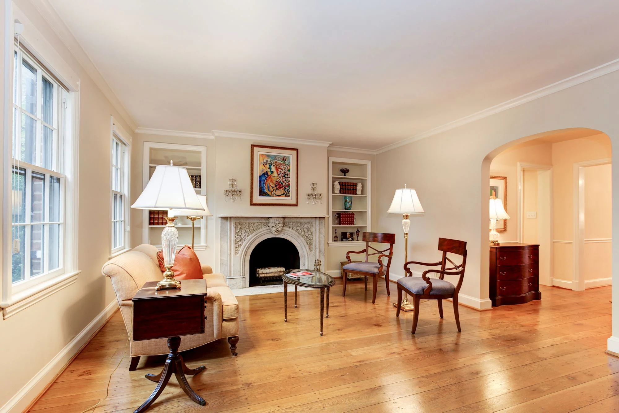 Spacious Living Room with Historic Mantle