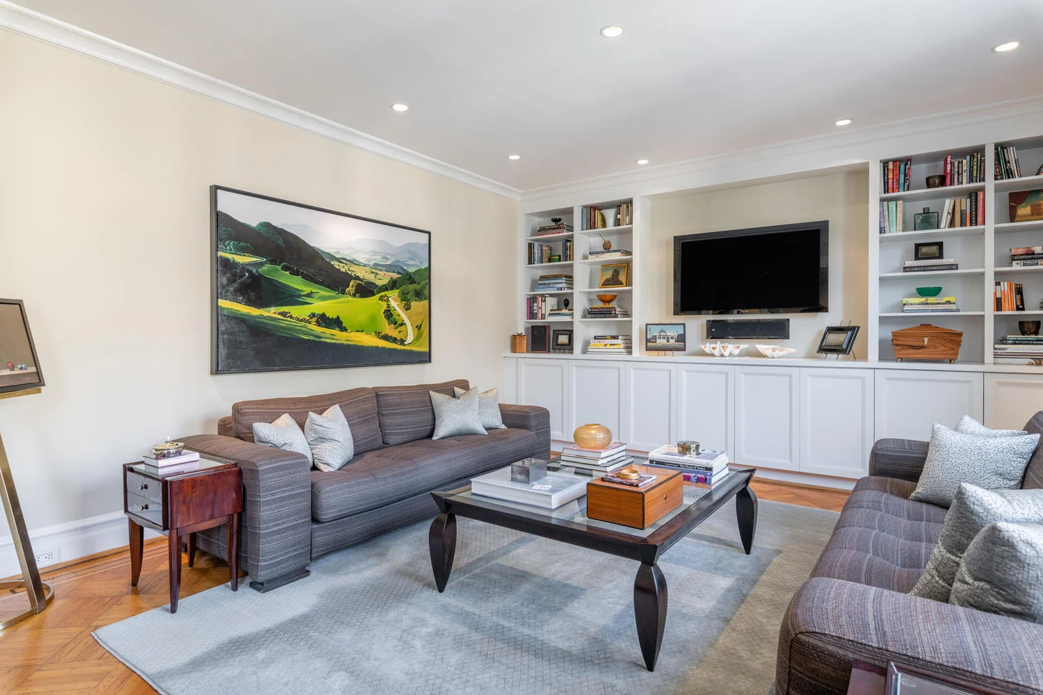 Spacious Family Room features Media Built-ins