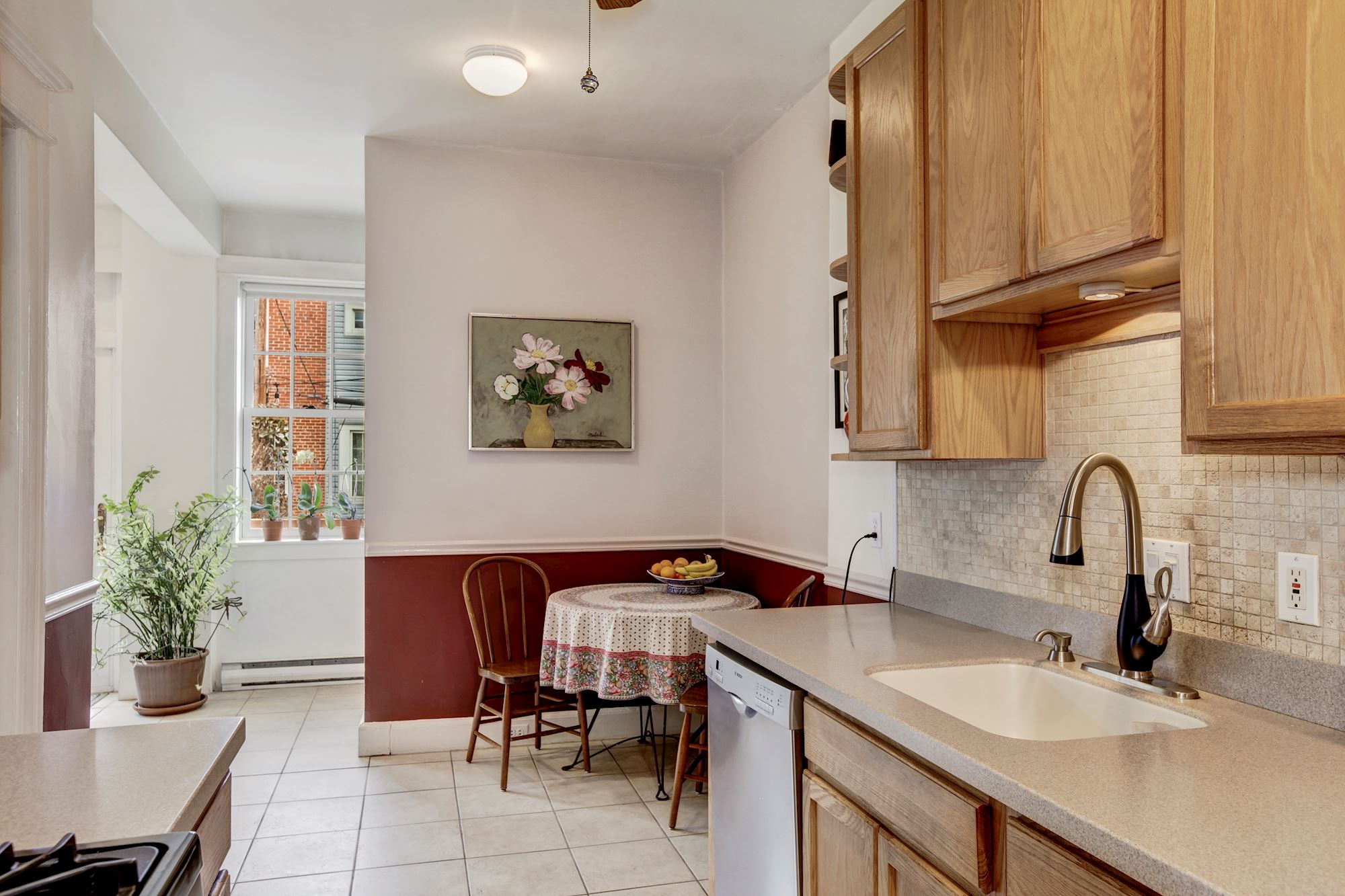 Kitchen Opens to Sunroom and Rear Deck