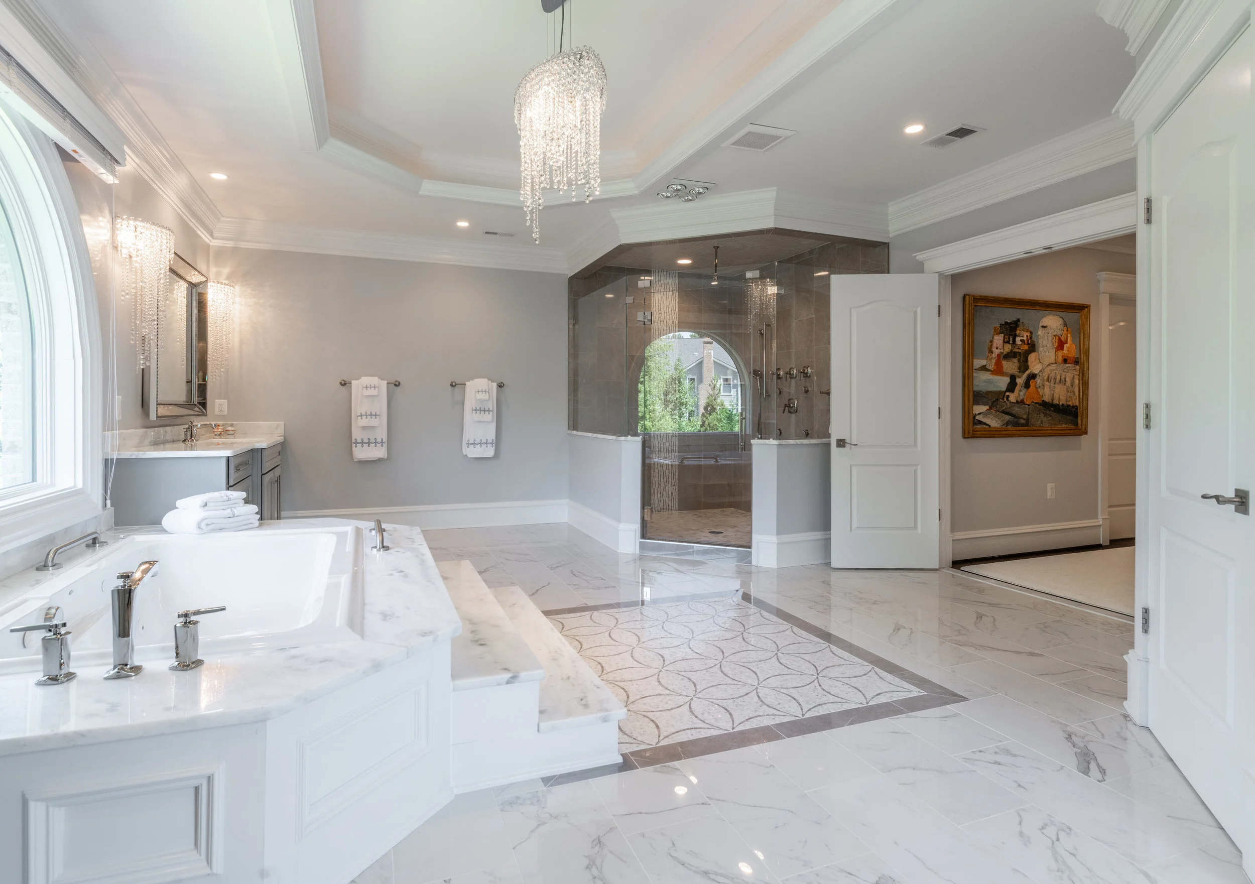 Master Bathroom with jetted tub and spacious frameless glass shower