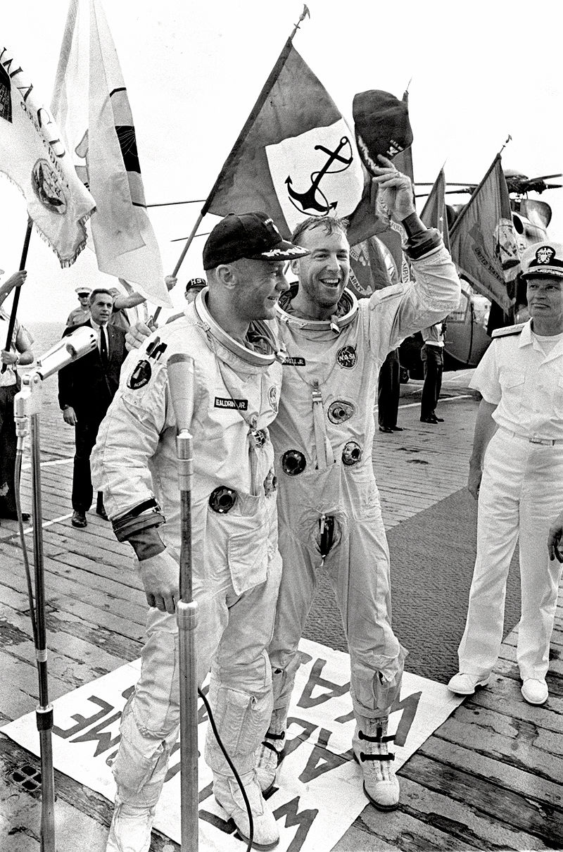 Buzz Aldrin (L) and Jim Lovell (R) aboard the U.S.S. Wasp after splashing down in the Atlantic Ocean. Photo credit: NASA