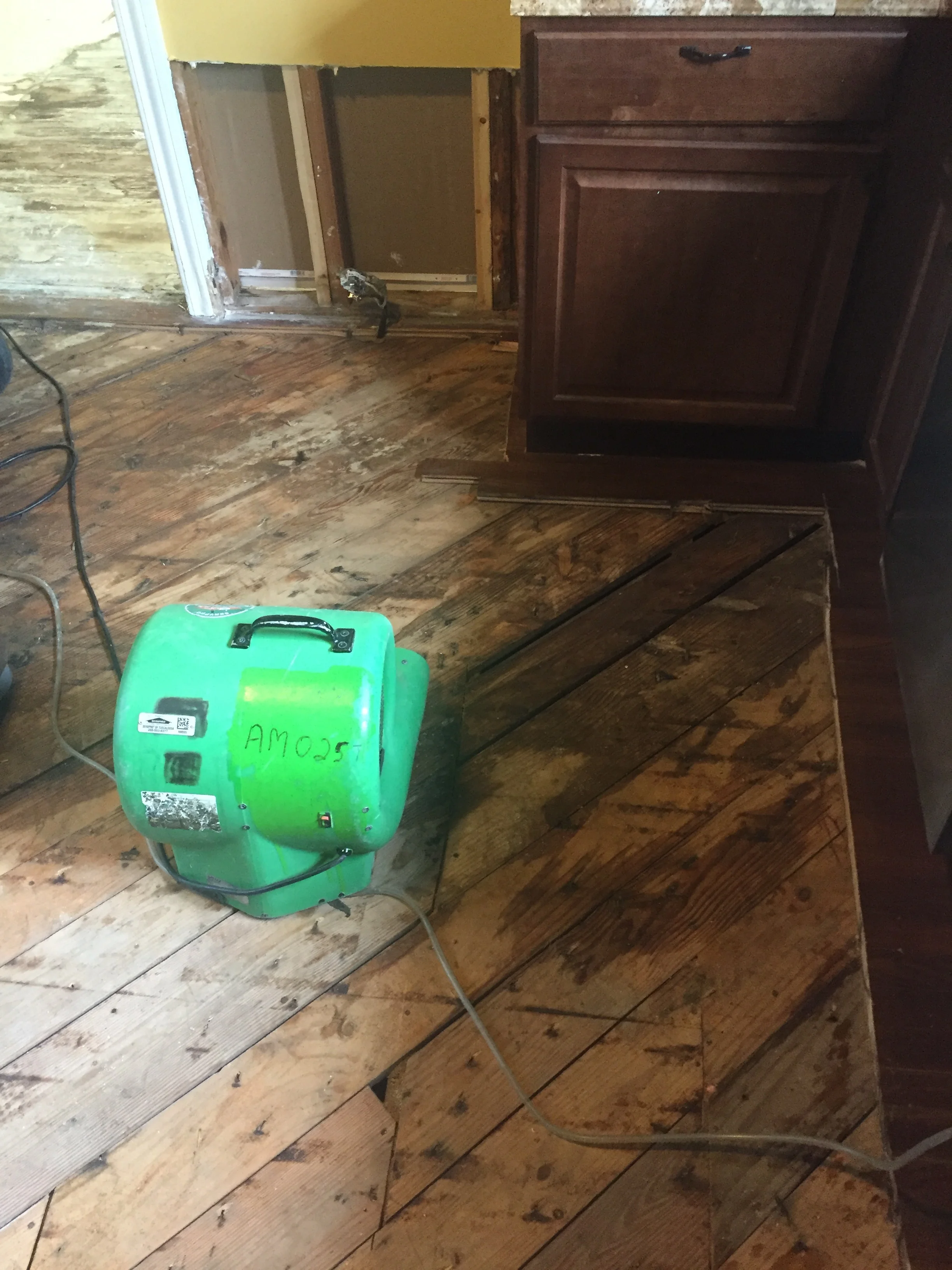 In progress - Kitchen Floor Removal & a Broken Live Outlet