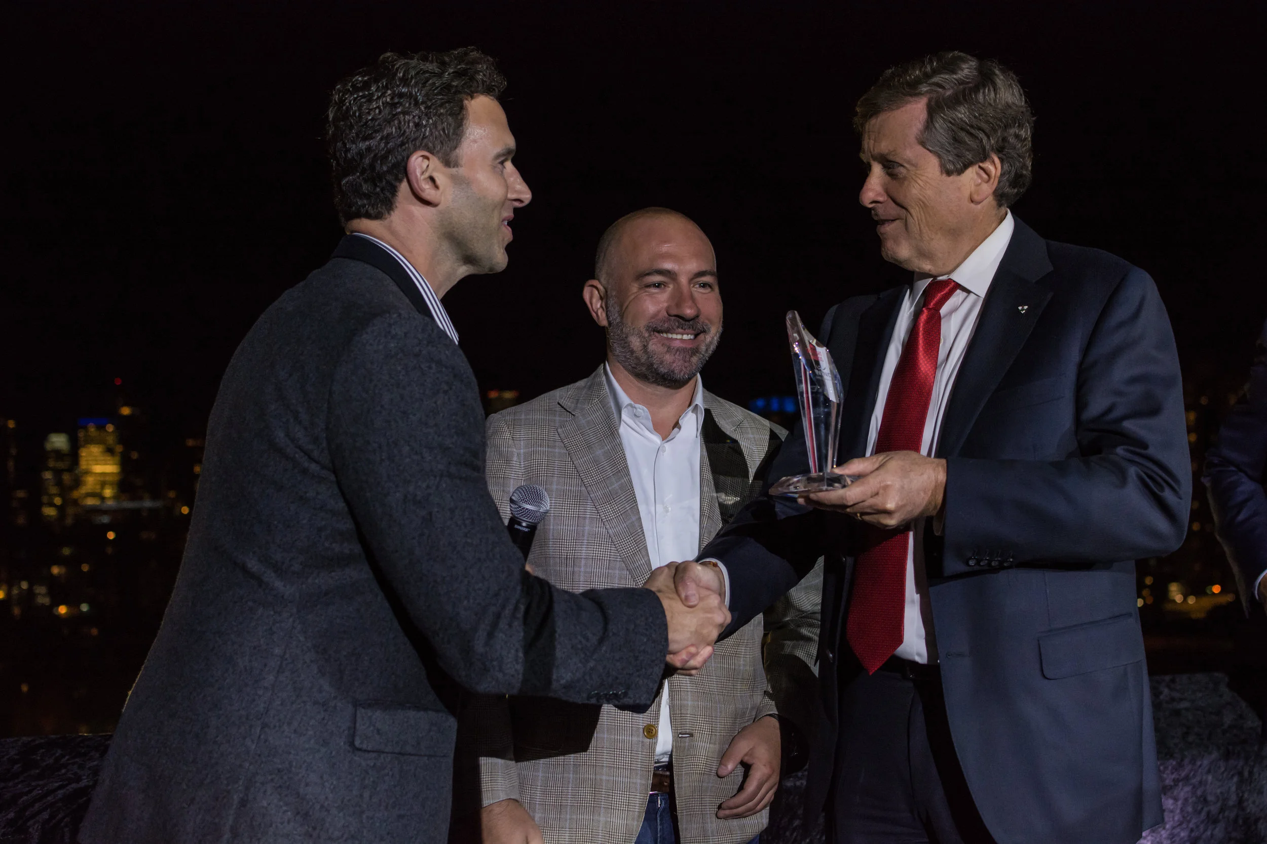 The Mayor presents a Unicorn Award to Tony Lacavera and his team from Wind