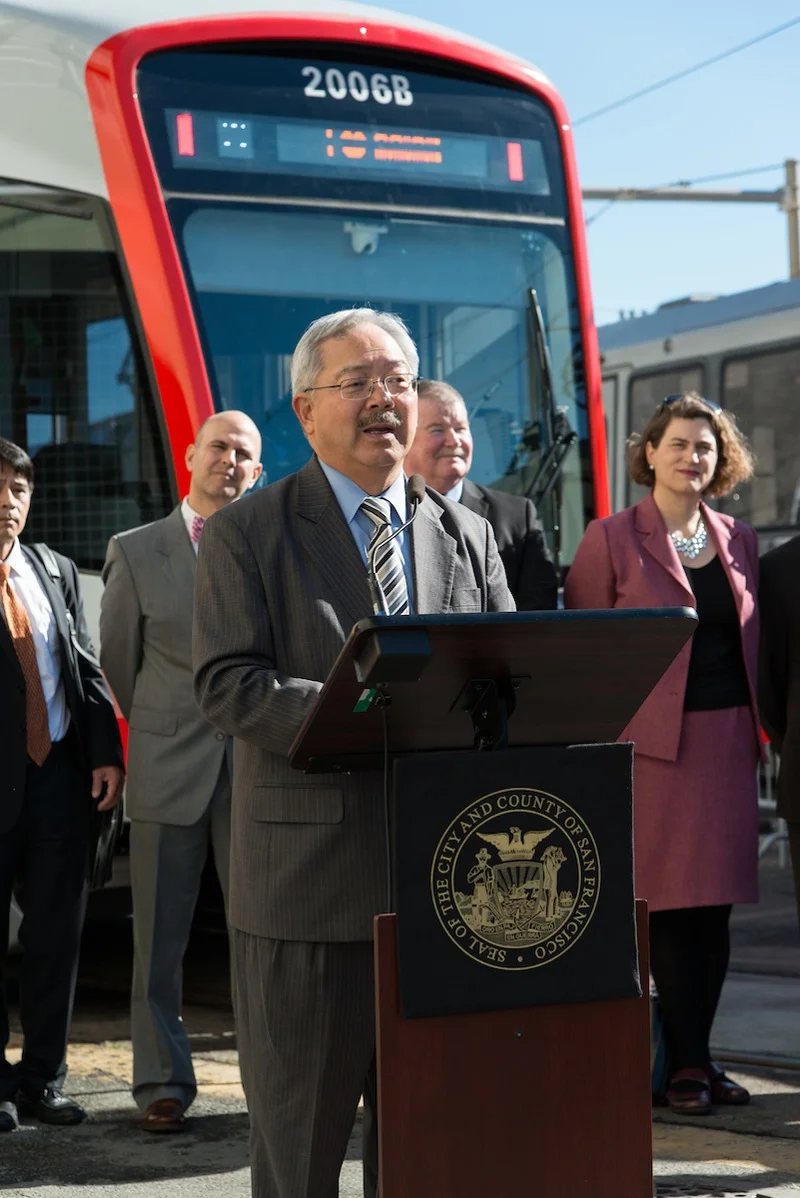 The late Mayor Ed Lee speaks at the light rail project's ribbon cutting
