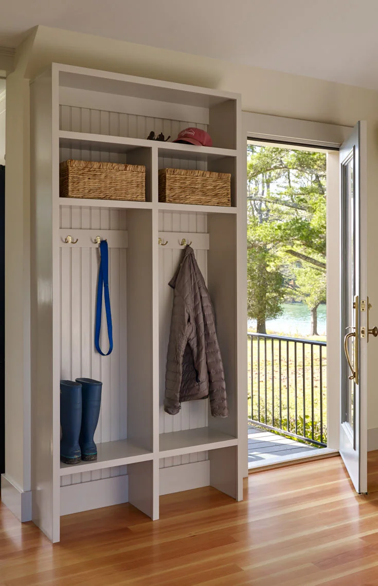 NEW MEADOWS RETREAT Mudroom with door to water-side deck