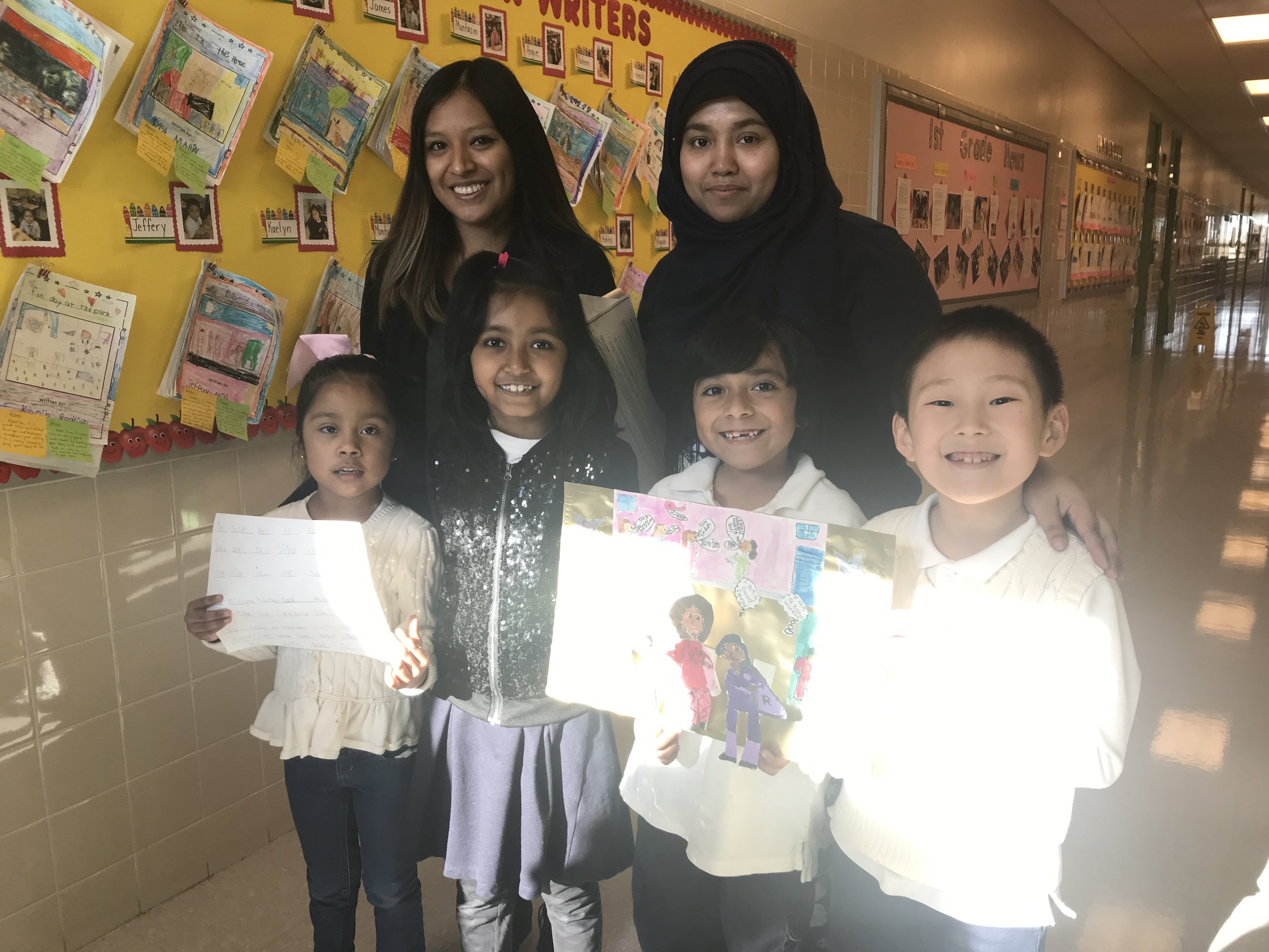 students pictured with their submissions for the respect for all contest! Check out their amazing 3 d art and writing!
