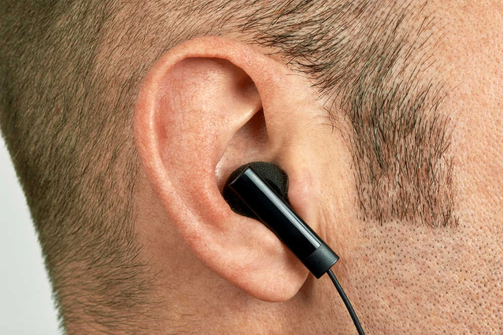 Headphones/Earbuds fitting into an ear
