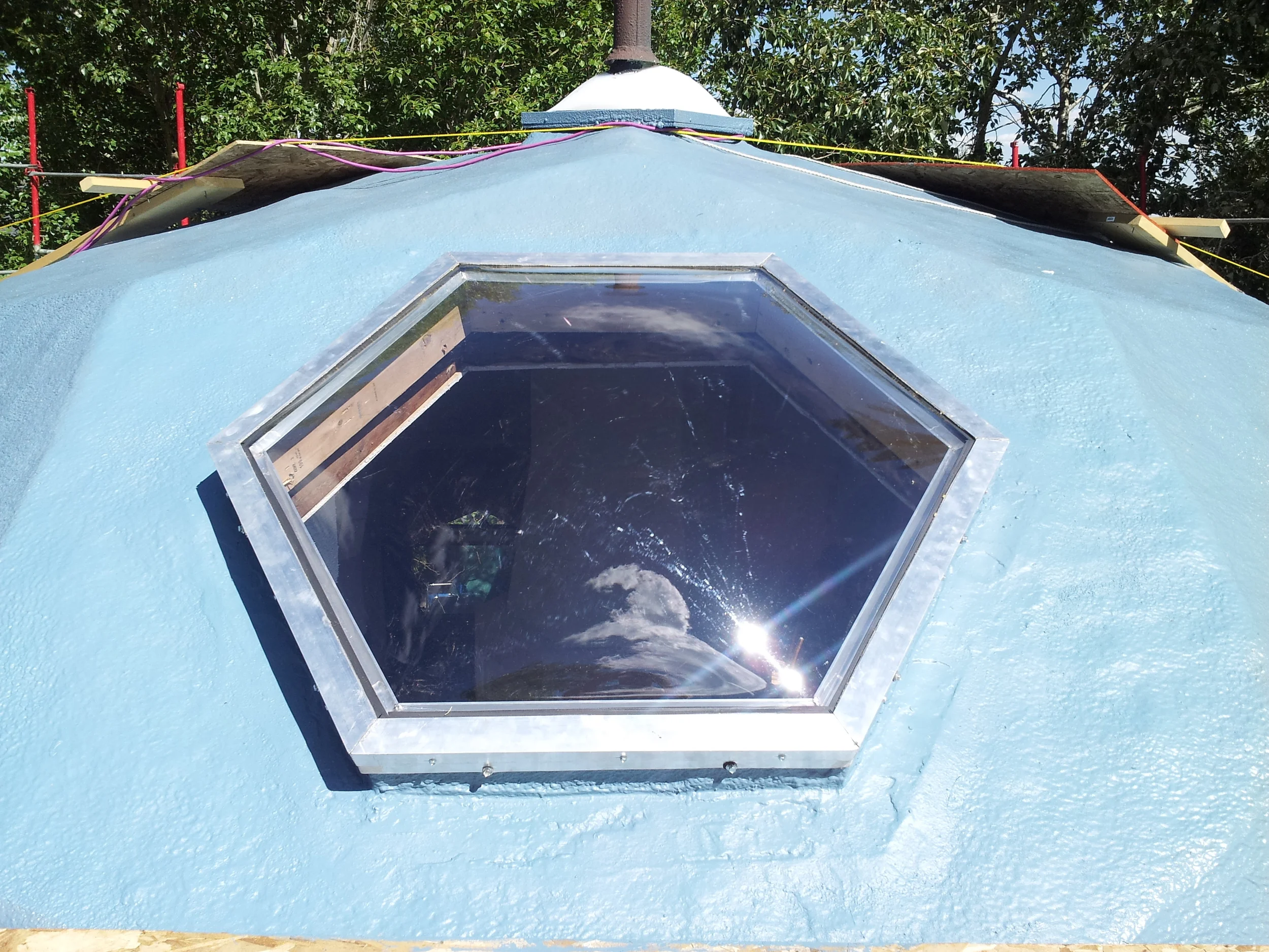  A custom made hexagonal skylight replacing an old leaking window on top of a geodesic dome home.&nbsp; 