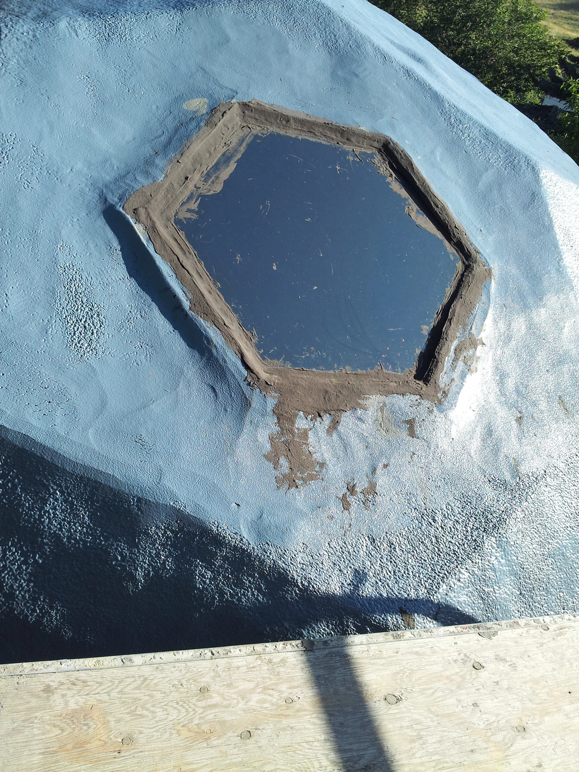  Original window. Water had been leaking in and they tried to repair with tar.&nbsp; 