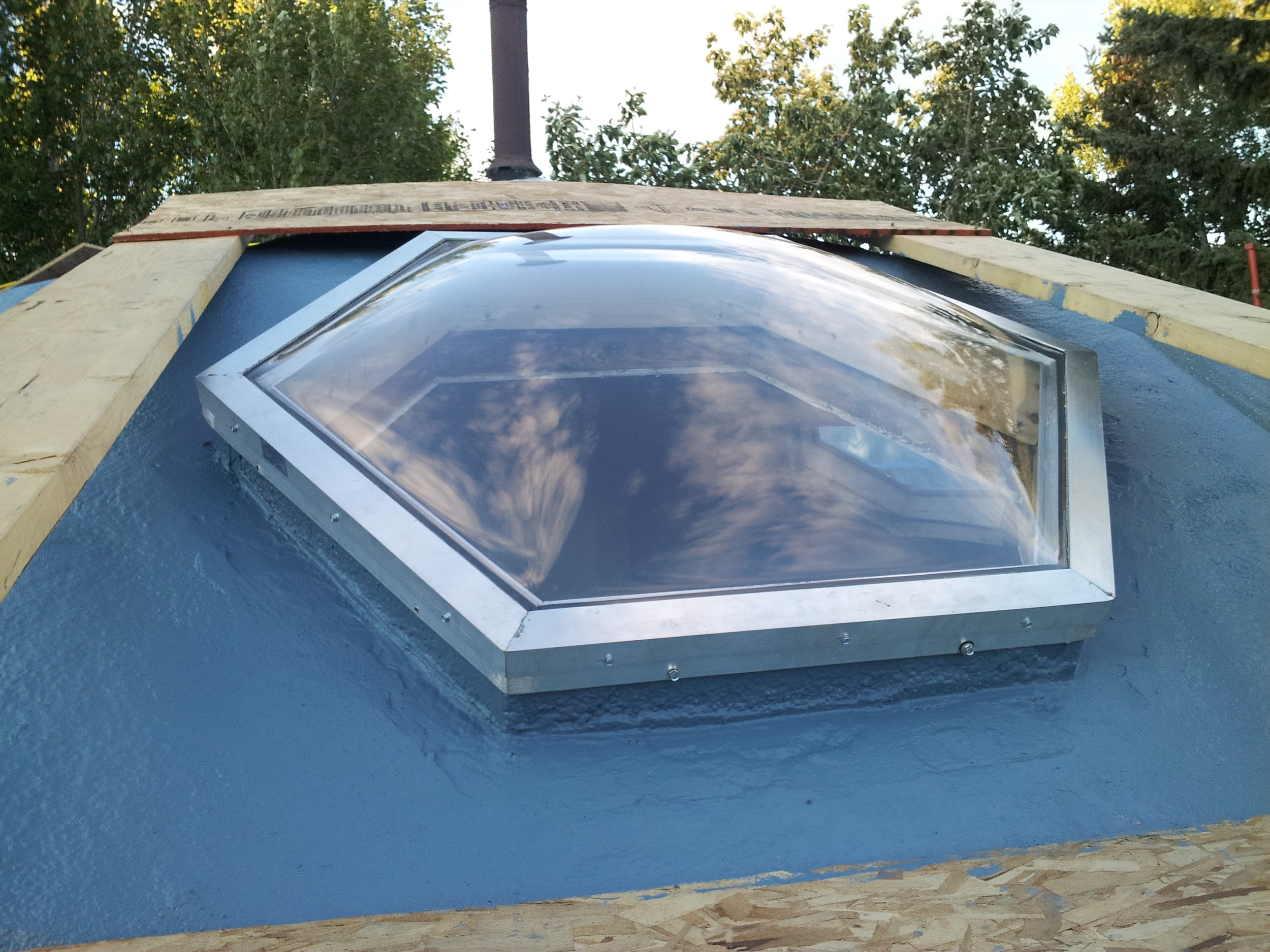  Then we coated the foam in a liquid membrane and finished it with&nbsp;paint color coded to match. The skylights were&nbsp;then installed.&nbsp; 