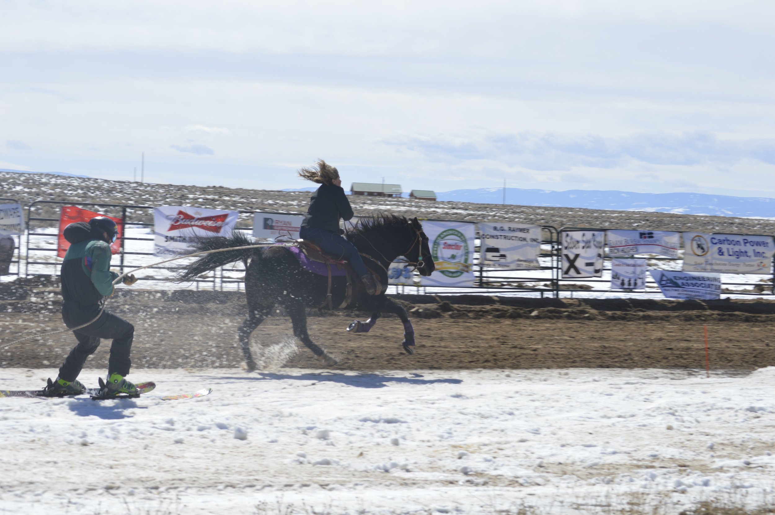 Sponsors’ Signs adorned the south fence…until Wyoming’s wind ended their display!