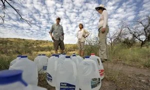 Activists leaving water for migrants crossing the desert