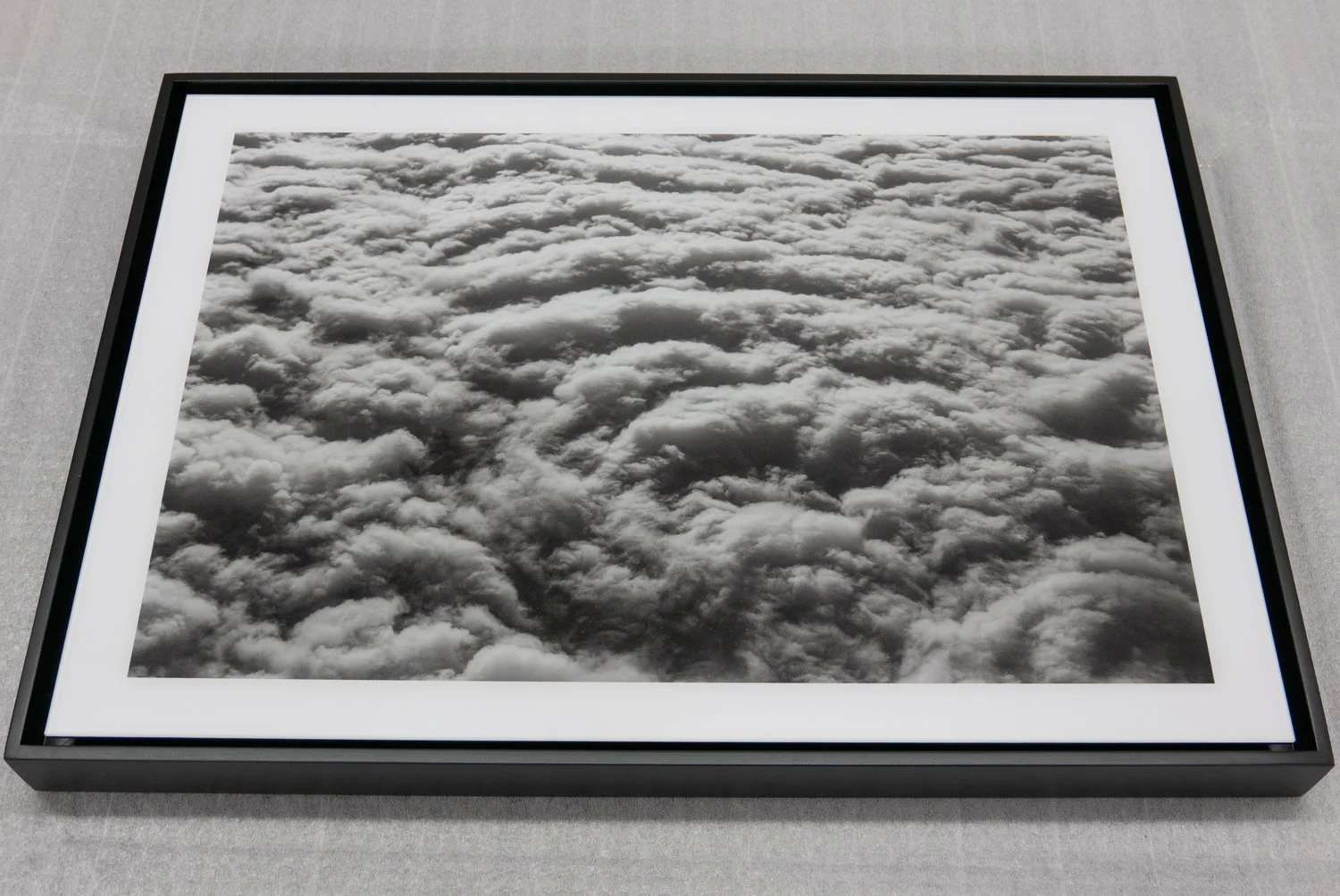 Piezography inks on archival photo premium gloss face mounted on matte acrylic, maple floating frame and a lacquer finish