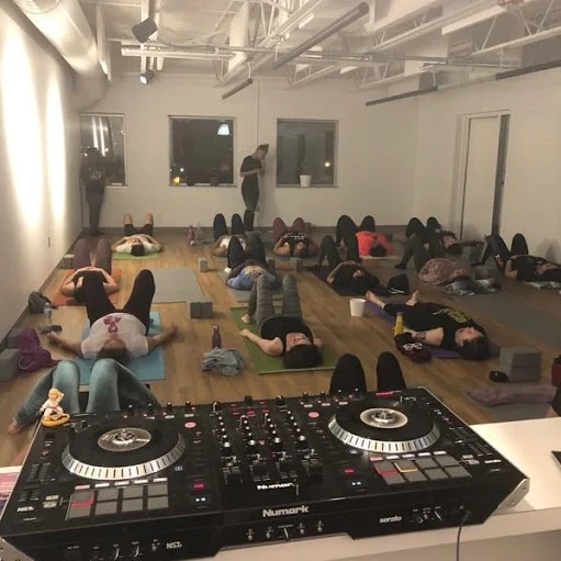 Joanna Brooks, Owner and CEO of Embody Yoga instructs a class during one of her sold out special events.