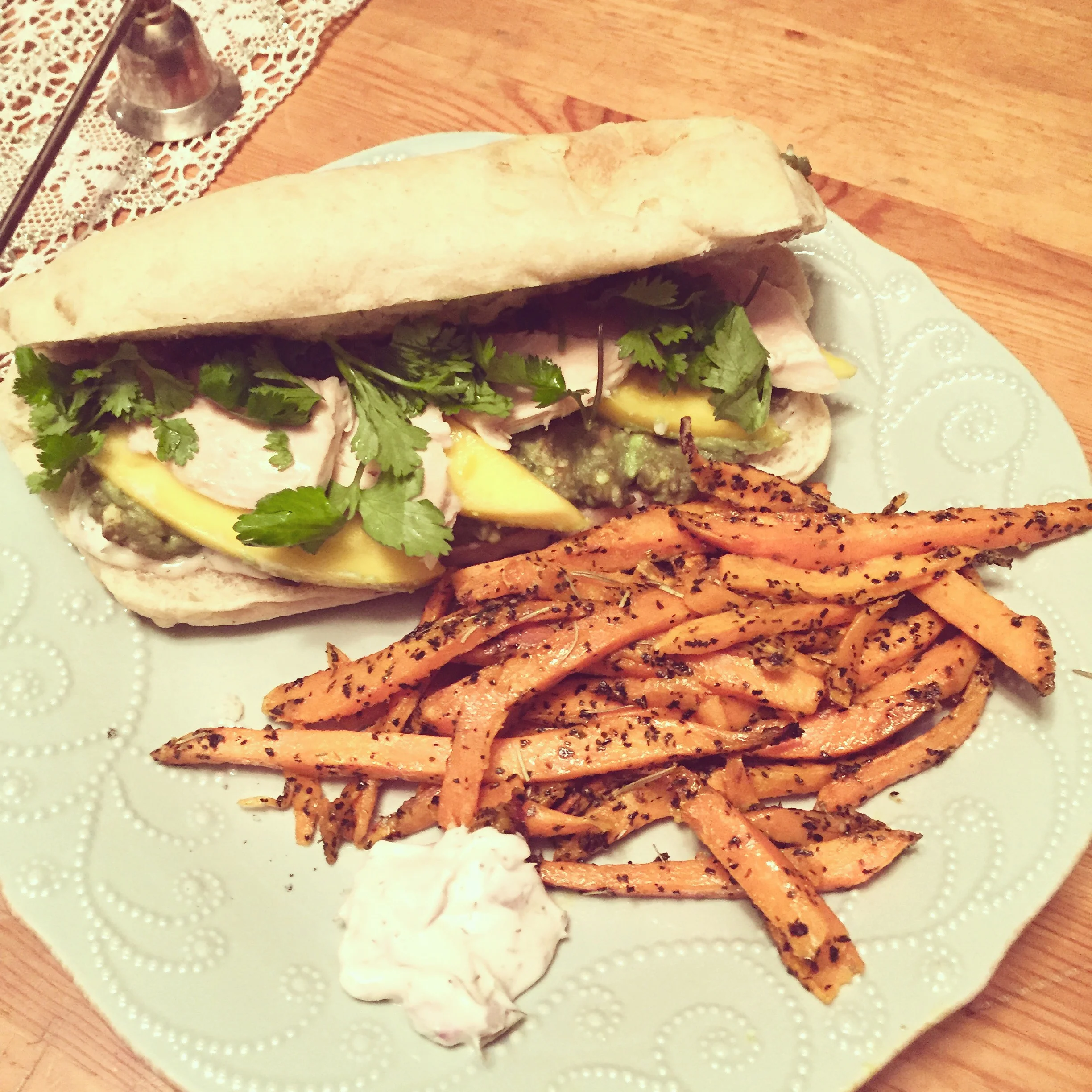 Mango avocado chicken sandwich and sweet potato fries!