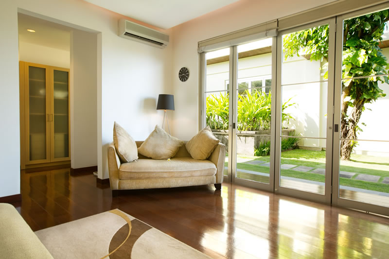 sanur-residence-villa-1-master-bedroom-couch-walk-in-closet.jpg