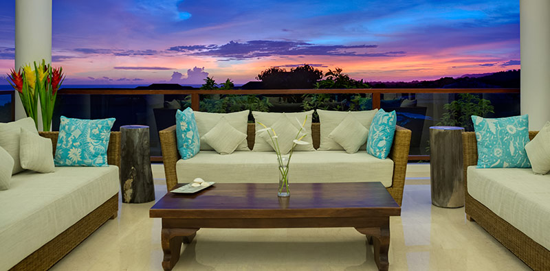 pandawa-cliff-estate-villa-rose-balcony-sitting-area-at-sunset.jpg