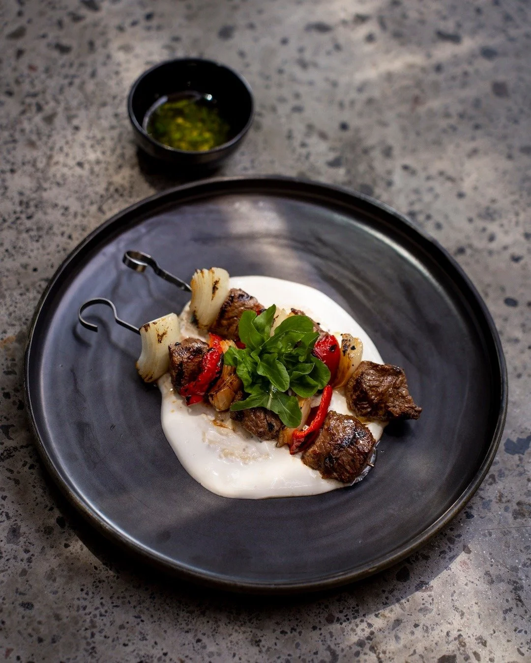Because lunchtime deserves a little fire. Angus tenderloin skewers, bold flavors, rooftop vibes. 🌿🔥🥩 #UbudEats #APerfectBite

ANGUS TENDERLOIN SKEWER
chimichurri, garlic cream, roasted sesame mayo, arugula, pickled red cabbage
+ l u n c h  m a i n