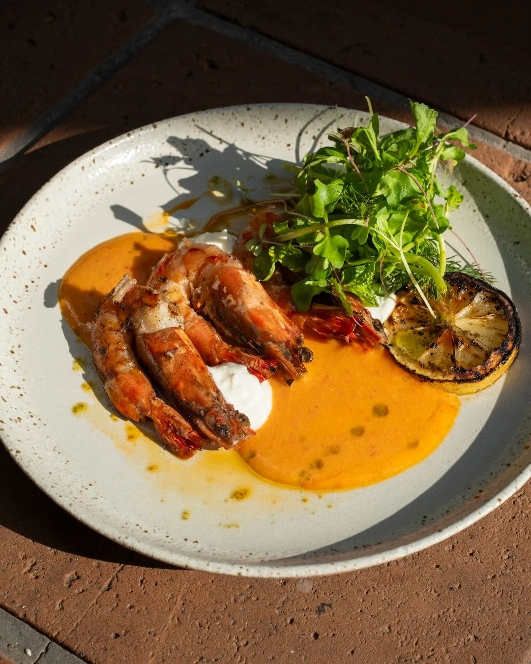 Spice, smoke, and a squeeze of charred lemon &mdash; this grilled prawn means business. 🌿🔥 #UbudEats #APerfectBite

GRILLED PRAWN
labneh, red chili aioli, cured egg, charred lemon
+ d i n n e r  s t a r t e r

Book A Table
Call +623614792888
WA +62
