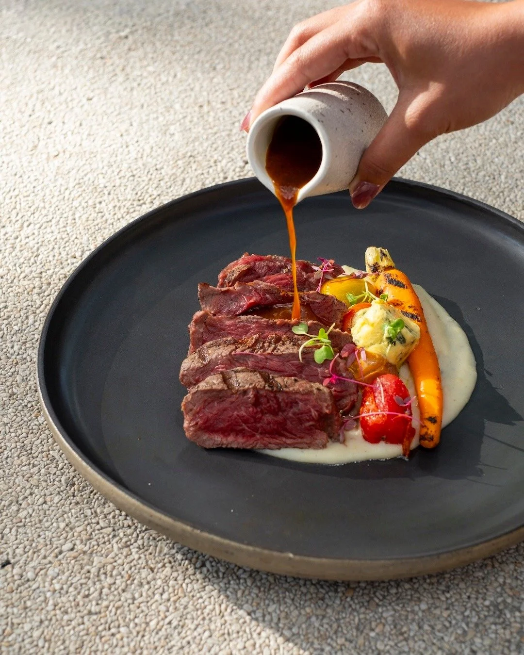 Balanced richness, clean flavors, and melt-in-your-mouth tenderness &mdash; our Tenderloin MB3 at its best. 🥩✨ #UbudEats #APerfectBite

TENDERLOIN MB3
grilled tomato &amp; baby carrot, classic mash, herb crumble, cafe de paris, steak au jus
+ d i n 