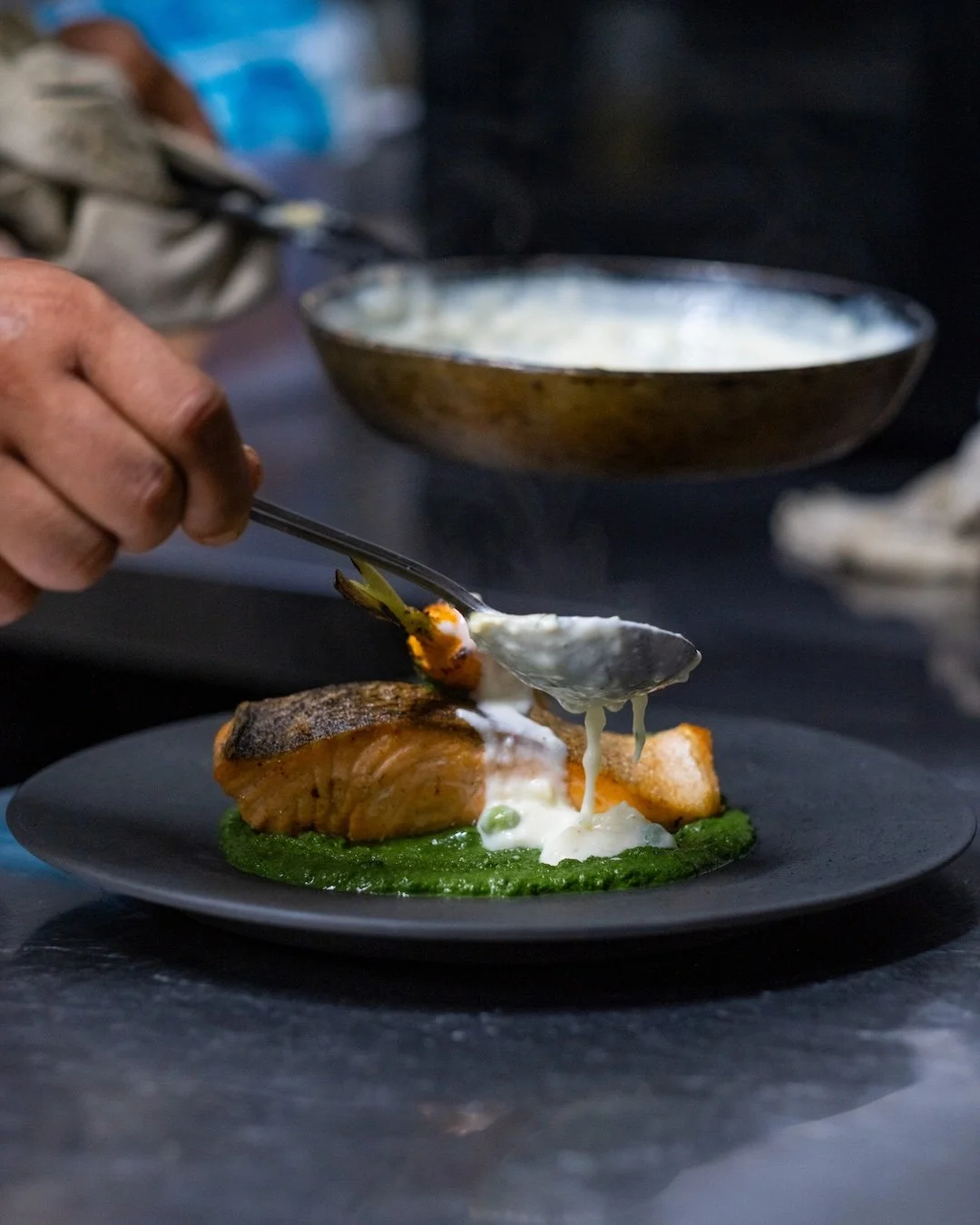 Crisp, vibrant, and beautifully balanced. Grilled Tasmanian Salmon with creamy basil oil, green pea pur&eacute;e, asparagus, pickled fennel, and corn chips at Copper Kitchen, Bar &amp; Rooftop. 🌿🐟 #UbudEats #APerfectBite

Book A Table
Call +6236147