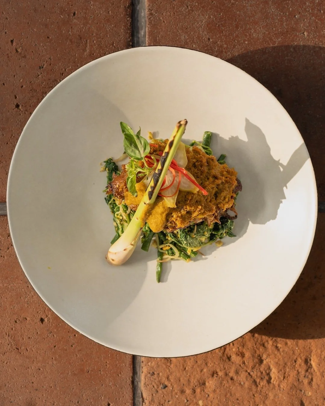 Slow-cooked. Deeply spiced. Ready for the table.

Our Duck Leg Betutu brings tender duck together with vegetables, rice, sambal, and a sharp starfruit pickle to cut through the richness.

A Balinese classic with a little Copper attitude. 🔥

Book A T